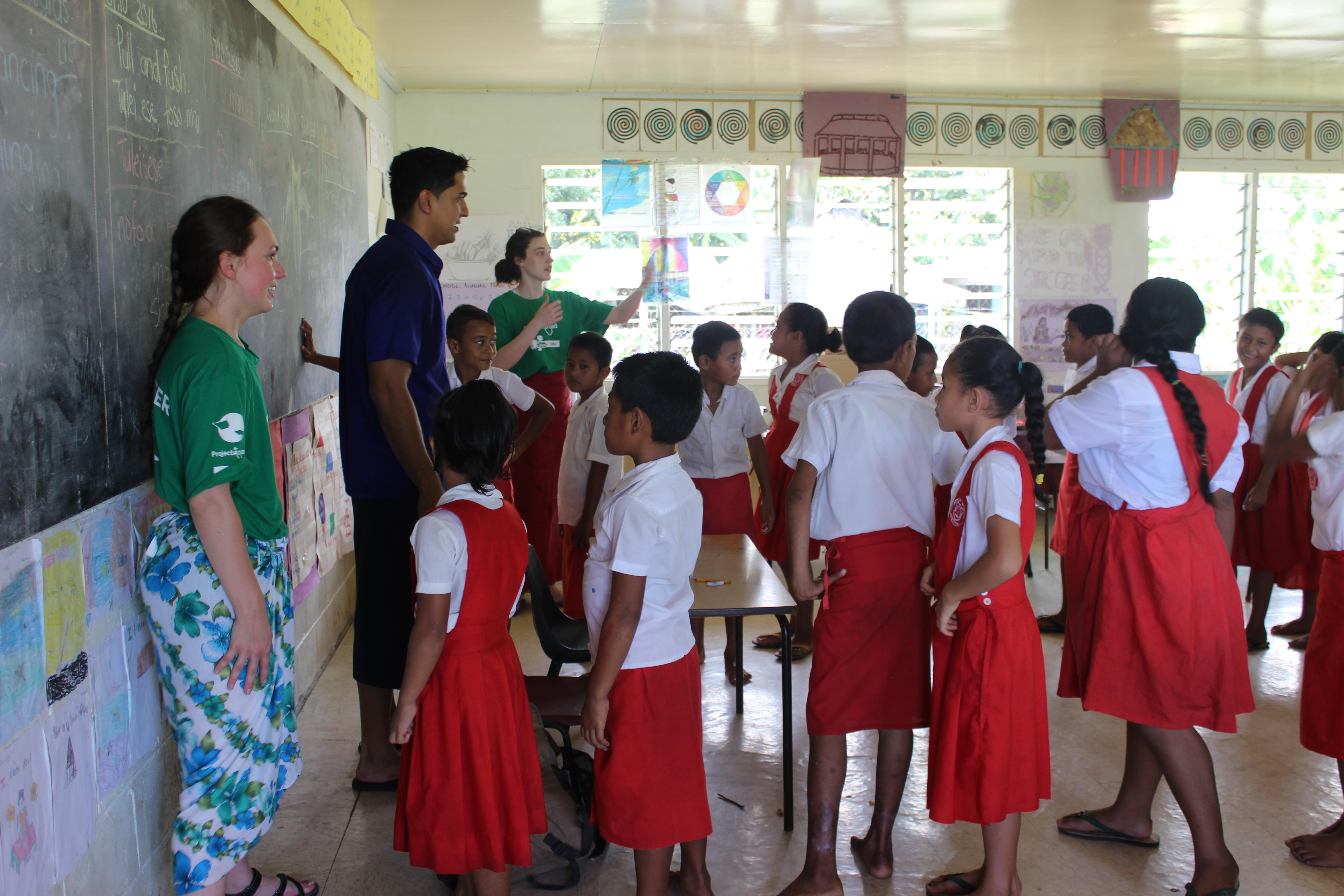 Projects Abroad interns teach a class for their nutrition work experience in Samoa. Students teach a class during their Nutrition internship in Samoa.